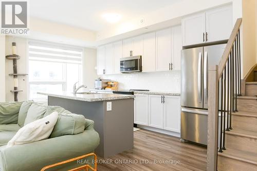 110 - 1593 Rose Way, Milton, ON - Indoor Photo Showing Kitchen With Stainless Steel Kitchen With Upgraded Kitchen