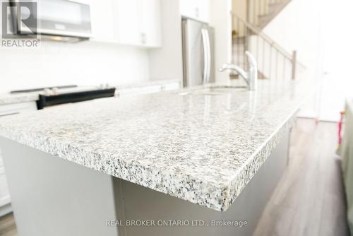 110 - 1593 Rose Way, Milton, ON - Indoor Photo Showing Kitchen With Upgraded Kitchen