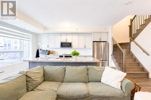 110 - 1593 Rose Way, Milton, ON - Indoor Photo Showing Living Room