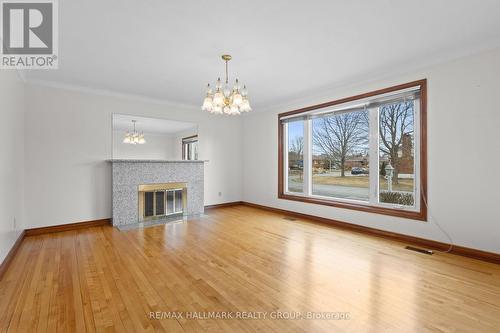 Formal Dining Room filled with natural sunlight - 1310 Ferguson Street, Ottawa, ON - Indoor Photo Showing Other Room With Fireplace