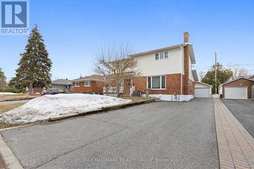 aved driveway w/parking for at least 7 vehicles - 1310 Ferguson Street, Ottawa, ON - Outdoor
