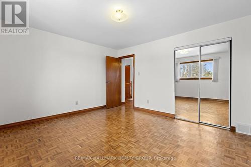 Third Bedroom With Mirrored Closet & Hardwood F. - 1310 Ferguson Street, Ottawa, ON - Indoor Photo Showing Other Room