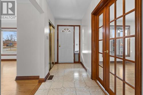 Bright Foyer With Mirrored Closets - 1310 Ferguson Street, Ottawa, ON - Indoor Photo Showing Other Room
