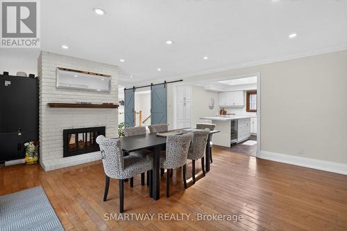 11 Meadow Drive, Caledon, ON - Indoor Photo Showing Dining Room With Fireplace