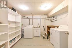 Laundry room with sewage pump - 