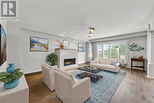 7 - 255 Summerfield Drive, Guelph, ON - Indoor Photo Showing Living Room With Fireplace
