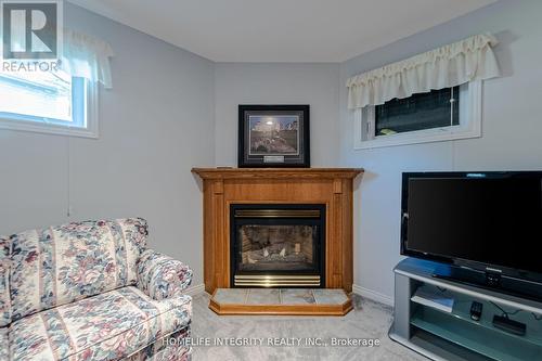 37 Brouwer Crescent, Wasaga Beach, ON - Indoor Photo Showing Living Room With Fireplace