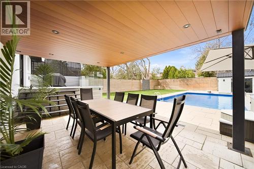 The property features a covered patio with recessed lighting and a paved stone floor - 2467 Bonner Road, Mississauga, ON - Outdoor With Deck Patio Veranda With Exterior