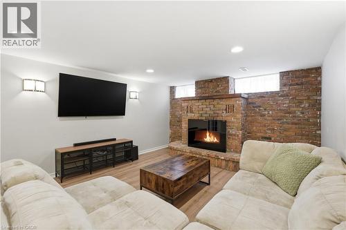55 Berkley Crescent, Simcoe, ON - Indoor Photo Showing Living Room With Fireplace