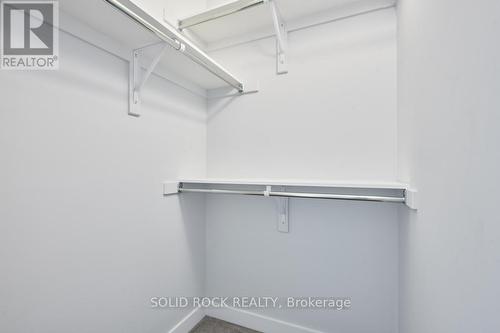 Walk in closet in the primary bedroom - 512 Pilot Private, Ottawa, ON - Indoor With Storage