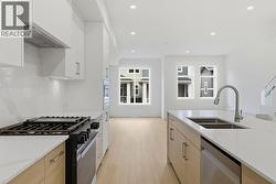 Kitchen. Photo is of a similar home in the community - 