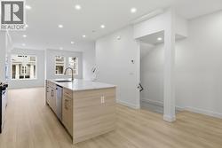 Kitchen. Photo is of a similar home in the community - 