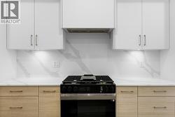 Kitchen. Photo is of a similar home in the community - 