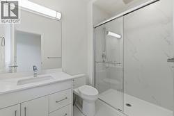 Primary Ensuite. Photo is of a similar home in the community - 