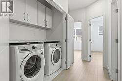 Laundry. Photo is of a similar home in the community - 