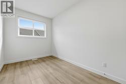 Second Bedroom. Photo is of a similar home in the community - 