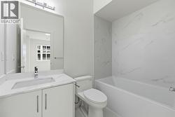 Lower Level Bathroom. Photo is of a similar home in the community - 