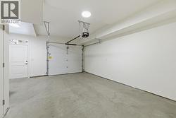 Garage. Photo is of a similar home in the community - 
