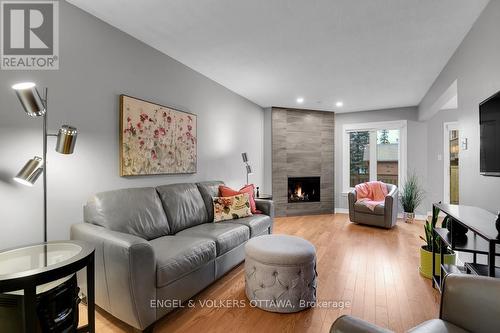 1 Maurya Court, Ottawa, ON - Indoor Photo Showing Living Room With Fireplace