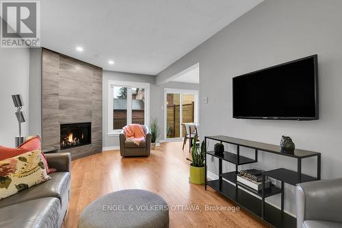1 Maurya Court, Ottawa, ON - Indoor Photo Showing Living Room With Fireplace