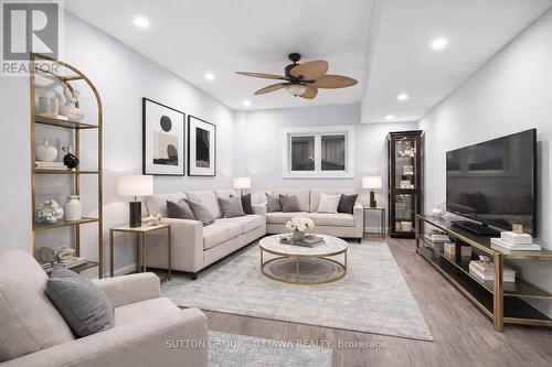 This photo is virtually staged - 81 Armstrong Street, Ottawa, ON - Indoor Photo Showing Living Room