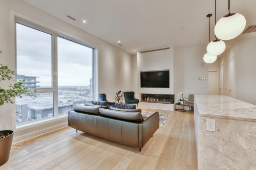 Living Room - 1501-1900 Rue Émile-Martineau, Laval (Laval-Des-Rapides), QC - Indoor Photo Showing Living Room With Fireplace