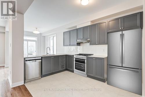 Virtually Staged Kitchen - 623 Terrier Circle, Ottawa, ON - Indoor Photo Showing Kitchen With Stainless Steel Kitchen