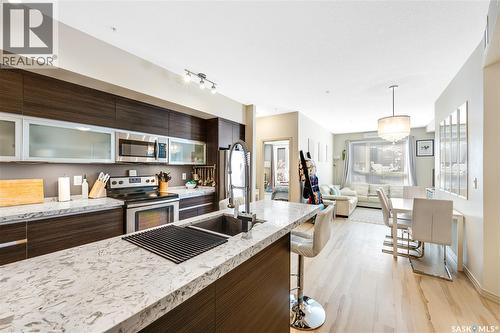 104 223 Evergreen Square, Saskatoon, SK - Indoor Photo Showing Kitchen With Stainless Steel Kitchen With Double Sink With Upgraded Kitchen