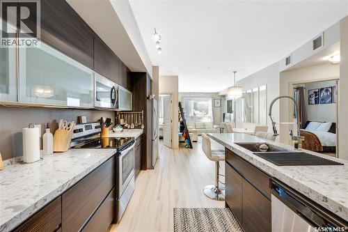 104 223 Evergreen Square, Saskatoon, SK - Indoor Photo Showing Kitchen With Stainless Steel Kitchen With Double Sink With Upgraded Kitchen