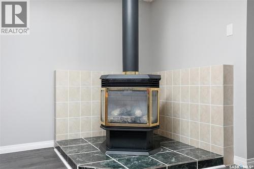 418 Pinehouse Drive, Saskatoon, SK - Indoor Photo Showing Other Room With Fireplace