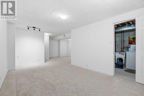 FAMILY room in finished lower level. - 38 - 2665 Thomas Street, Mississauga (Central Erin Mills), ON - 
