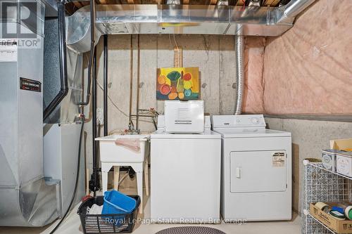 Lower level LAUNDRY with SINK. APPLIANCES included - 38 - 2665 Thomas Street, Mississauga (Central Erin Mills), ON - Indoor Photo Showing Other Room