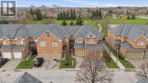 CHECK OUT that park! So much green space to enjoy! - 38 - 2665 Thomas Street, Mississauga (Central Erin Mills), ON - Outdoor With Facade