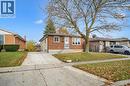 The property features a brick exterior, a paved driveway, and a front lawn - 217 Johanna Drive, Cambridge, ON  - Outdoor 
