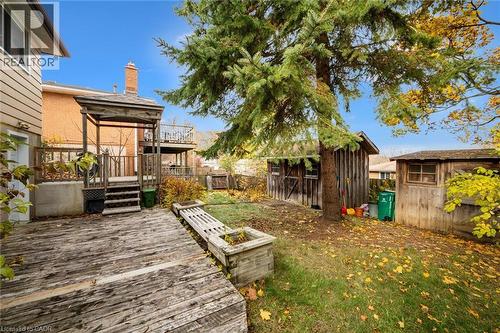 The property features a spacious backyard with a wooden deck and a gazebo - 217 Johanna Drive, Cambridge, ON - Outdoor With Deck Patio Veranda