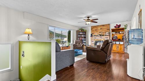 2107 Ash Street, Creston, BC - Indoor Photo Showing Living Room With Fireplace