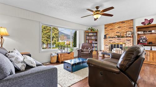 2107 Ash Street, Creston, BC - Indoor Photo Showing Living Room With Fireplace