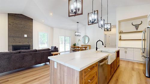 427 Wildstone Close, Cranbrook, BC - Indoor Photo Showing Kitchen With Fireplace