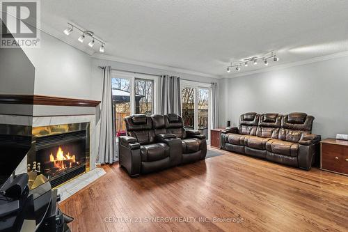 41 Hunterswood Crescent, Ottawa, ON - Indoor Photo Showing Living Room With Fireplace