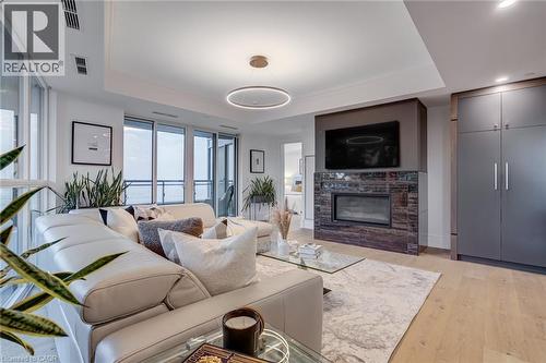 2060 Lakeshore Road Unit# 308, Burlington, ON - Indoor Photo Showing Living Room With Fireplace