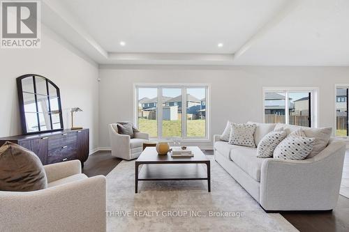 64 Basil Crescent, Middlesex Centre (Ilderton), ON - Indoor Photo Showing Living Room