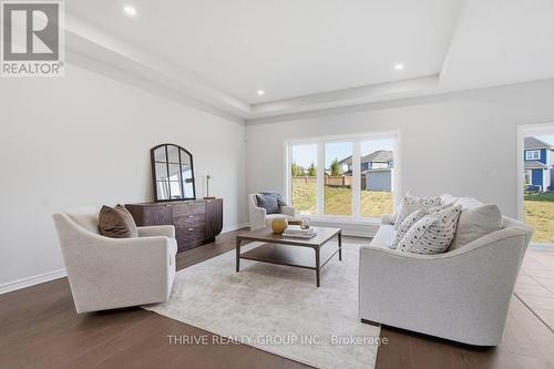 64 Basil Crescent, Middlesex Centre (Ilderton), ON - Indoor Photo Showing Living Room