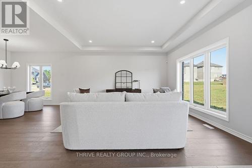 64 Basil Crescent, Middlesex Centre (Ilderton), ON - Indoor Photo Showing Living Room
