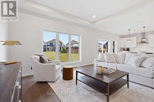 64 Basil Crescent, Middlesex Centre (Ilderton), ON - Indoor Photo Showing Living Room