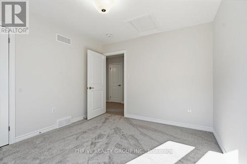 64 Basil Crescent, Middlesex Centre (Ilderton), ON - Indoor Photo Showing Other Room