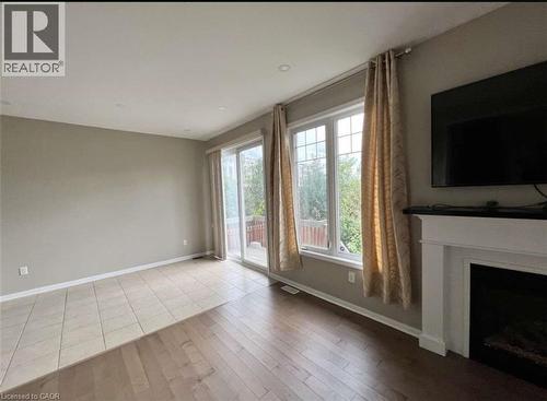 450 Cavanagh Lane, Milton, ON - Indoor Photo Showing Living Room With Fireplace