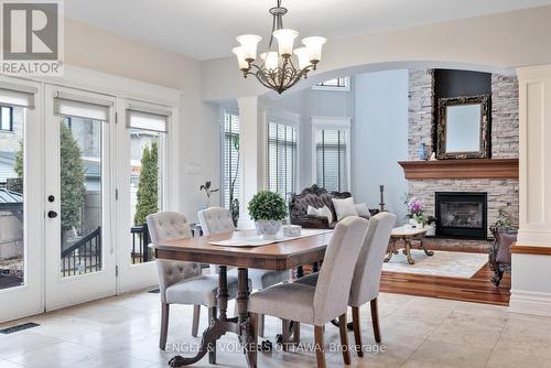 453 Rahul Crescent, Ottawa, ON - Indoor Photo Showing Dining Room With Fireplace