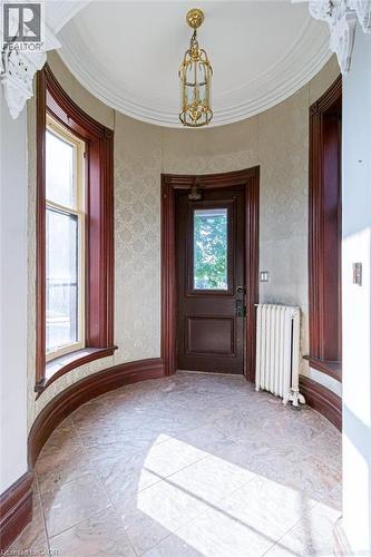 Front entrance to lobby w/ access to main, 2nd, and 3rd floor units - 347 Queen Street S, Hamilton, ON - Indoor Photo Showing Other Room