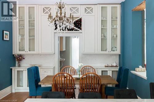 Custom built ins to match those in kitchen - 347 Queen Street S, Hamilton, ON - Indoor Photo Showing Dining Room