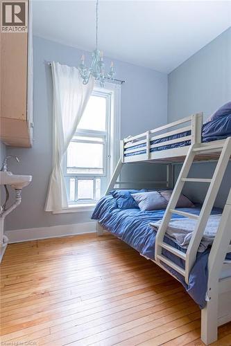 Butler's bedroom w. closet & 1 sink - 347 Queen Street S, Hamilton, ON - Indoor Photo Showing Bedroom